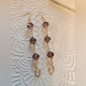 Purple three bead five inch drop earrings